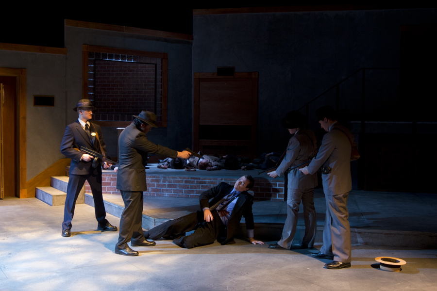 Men With Guns and Man fallen, shot.